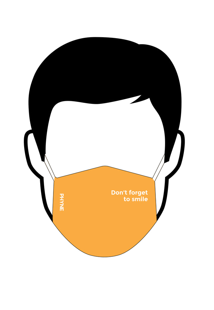 ["Illustration von Mund und Nasenmaske mit Don't Forget To Smile Print in Orange"]