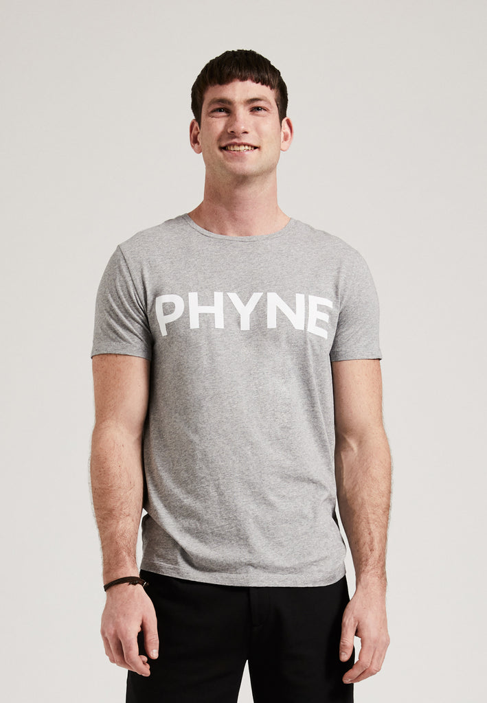 ["Grey", " Männliches Model trägt PHYNE Statement T-Shirt in grau"]